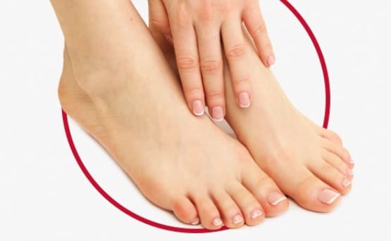 Healthy woman foot with gentle hand